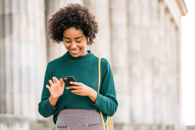 Customer using a mobile phone, representing Sparx Media digital services